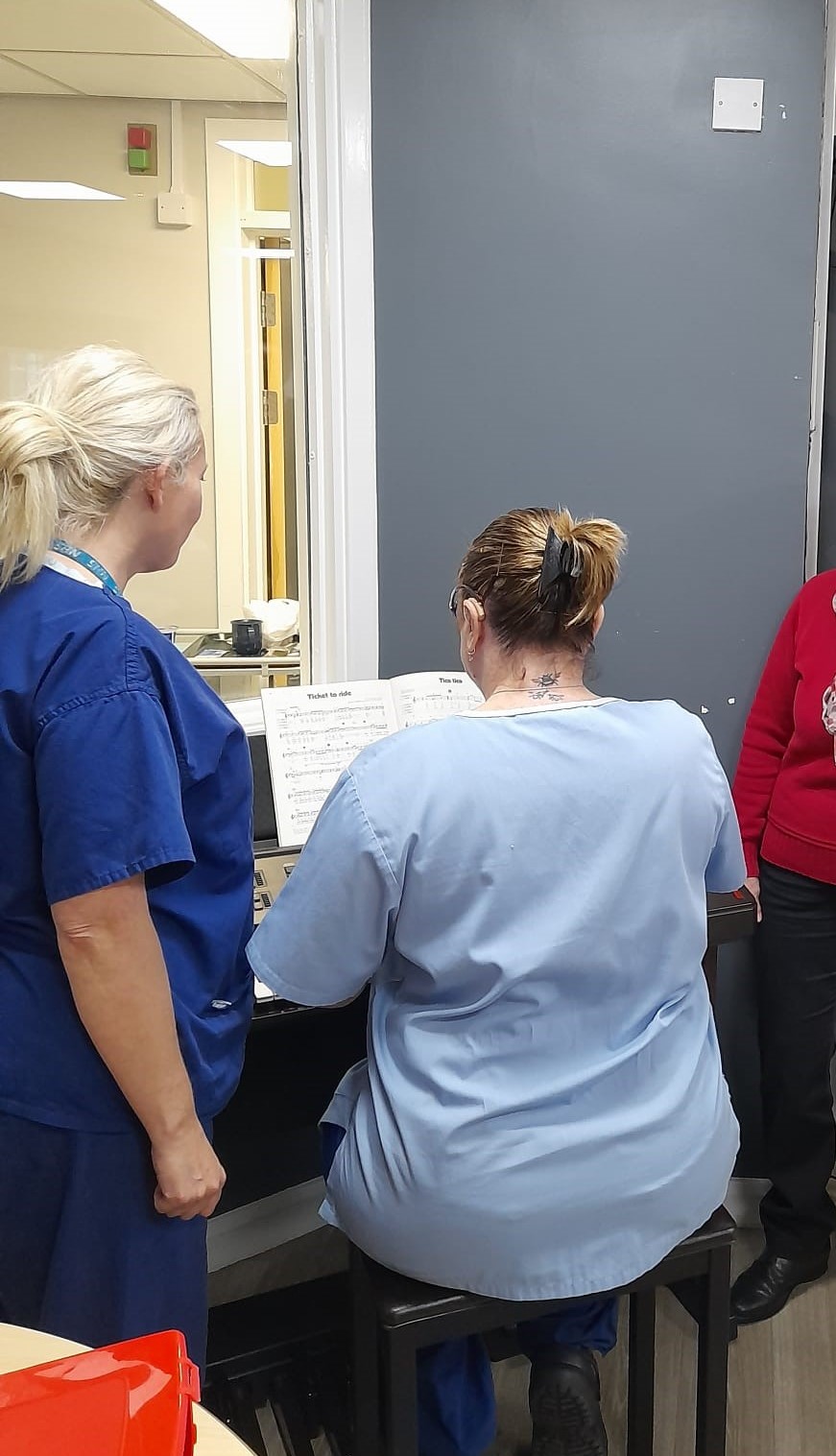 Staff at Skegness Hospital playing the organ.jpg